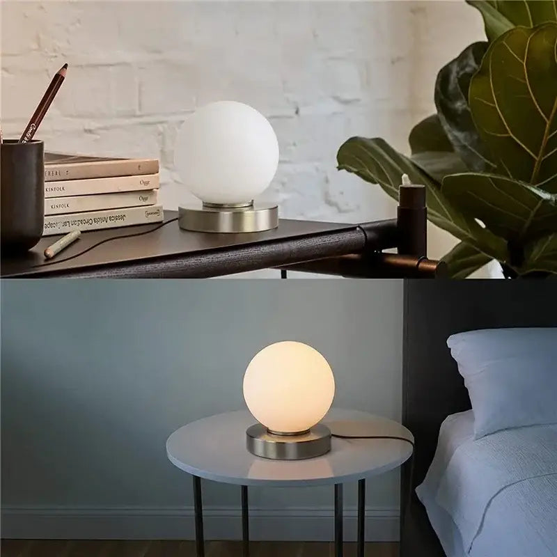 A sleek spherical frosted glass usb bedside lamp with a brushed metal base from decorbites glass usb collection