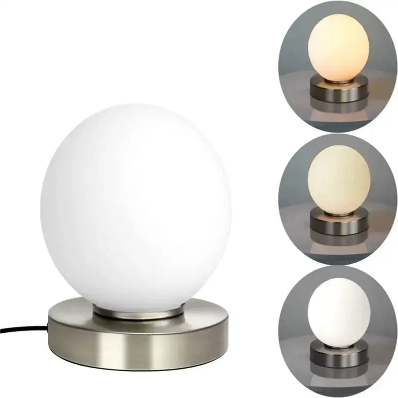 A sleek decorbites glass usb bedside lamp with frosted white globe and brushed stainless steel base for warm bedroom decor