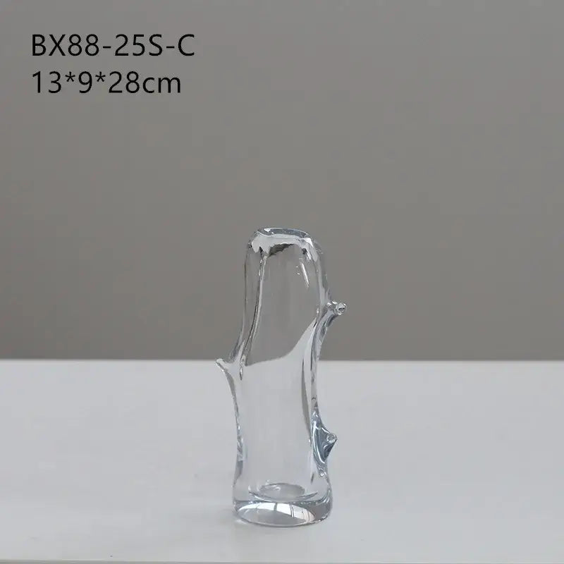 DecorBites glass vase shaped like a stylized tree trunk with smooth curves and branch-like protrusions for floral arrangements
