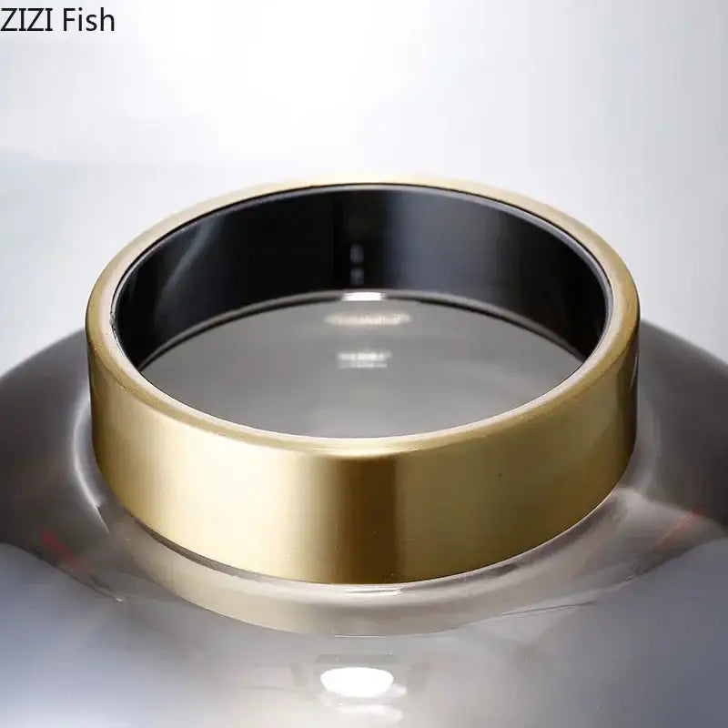 Gold-toned metallic ring with reflective inner surface and polished exterior for decorbites glass vase desk decoration