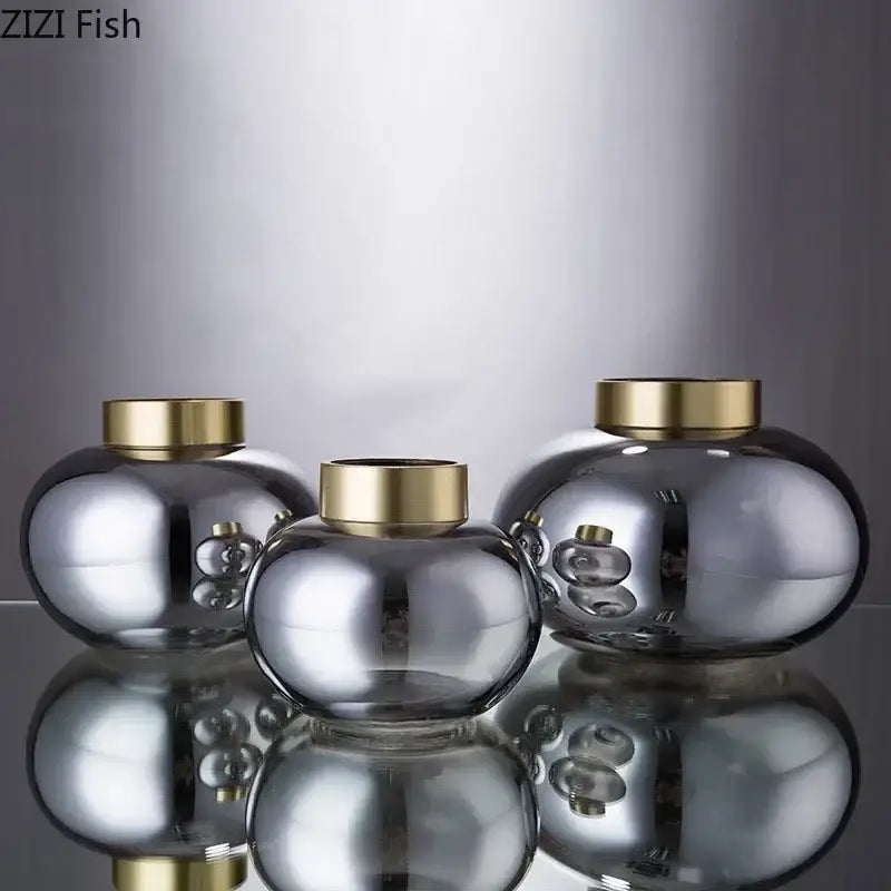 Set of three sleek metallic finish decorbites glass vases with polished gold lids ideal for glass vase desk decoration