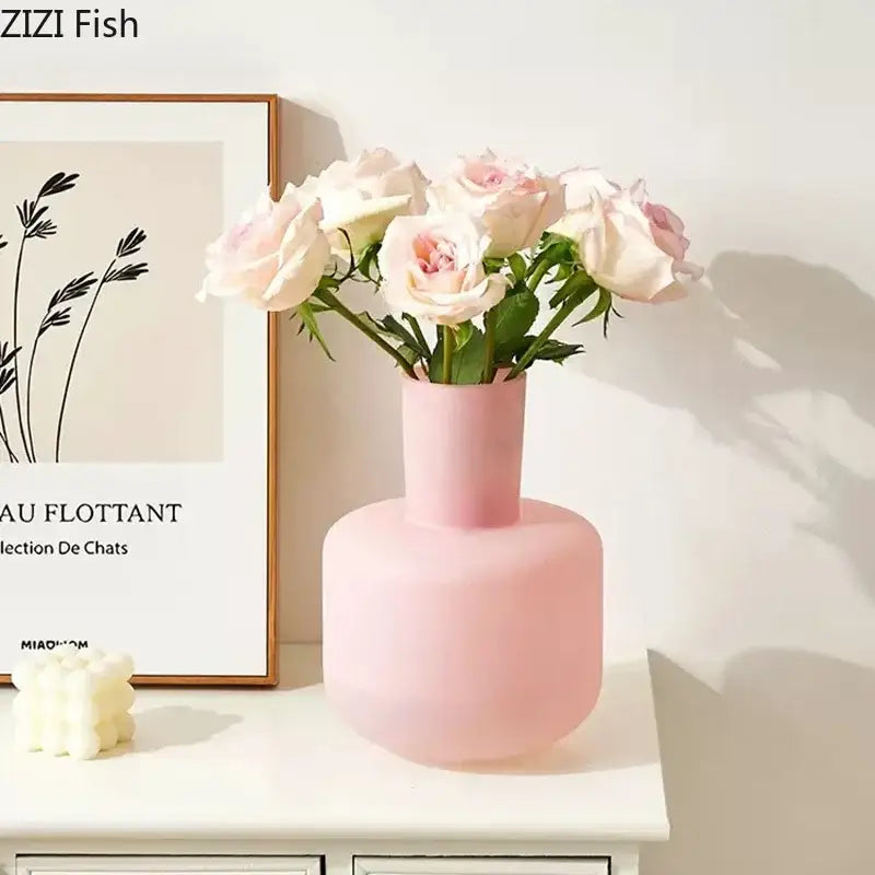 A soft pink matte-finished ceramic decorbites glass vase desk decoration pot with modern two-tiered design and artificial flowers