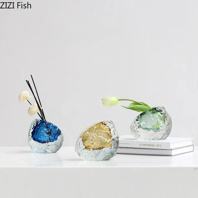Three translucent decorbites glass vases with colorful blue gold and green cores for elegant floral arrangement