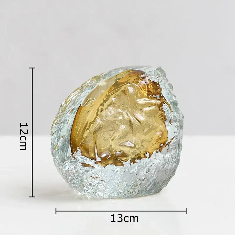 Translucent decorbites glass vase with icy blue outer layer and golden interior featuring elegant wrinkle design