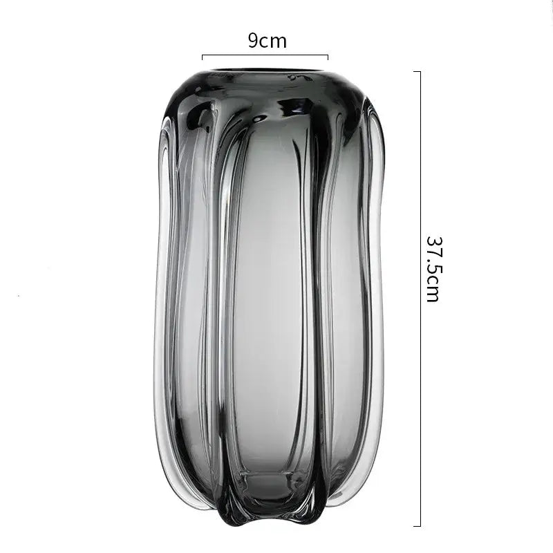 A sleek dark gray glass vase with vertical ridges and reflective surface by DecorBites glass vase for home decor