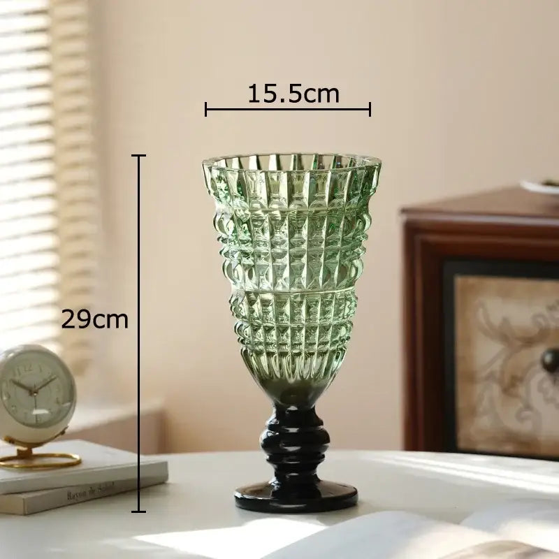 A 29cm green DecorBites glass vase with textured design and black base for hydroponics and room decor