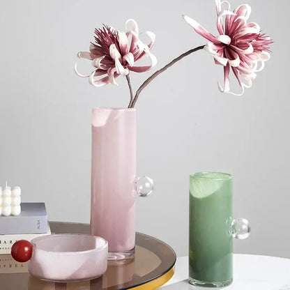 Pink frosted decorbites glass vase with geometric sphere clear handles and slender cylindrical shape for flowers and accessories