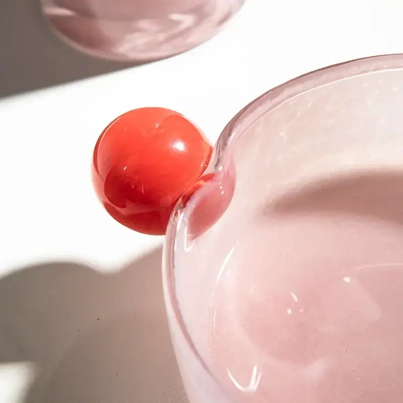 DecorBites glass vase geometric translucent pink glass cup with a vibrant red geometric sphere handle for decor