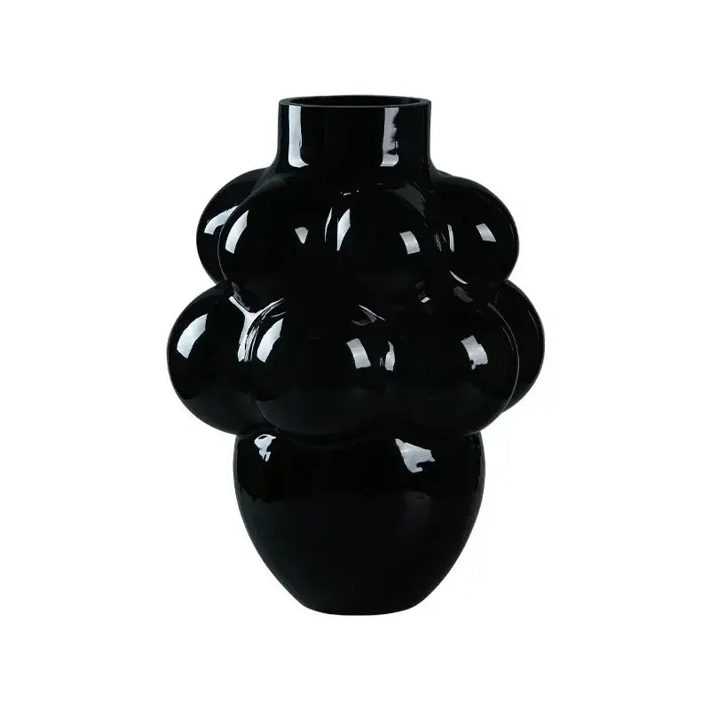 A glossy black decorbites glass vase with a unique bubbly grape geometric design for home decoration and hydroponic planting