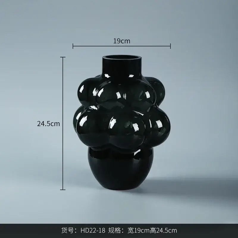 A glossy black ceramic decorbites glass vase grape geometric design 19cm wide by 24.5cm tall for home decoration