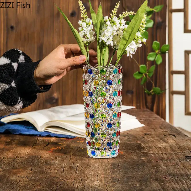 A tall clear decorbites glass vase with colorful rhinestones for hydroponics flower pots and desk decoration