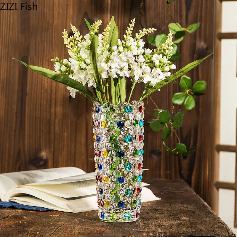 A tall cylindrical decorbites glass vase hydroponics flower pots decorated with colorful faceted gemstones mosaic pattern