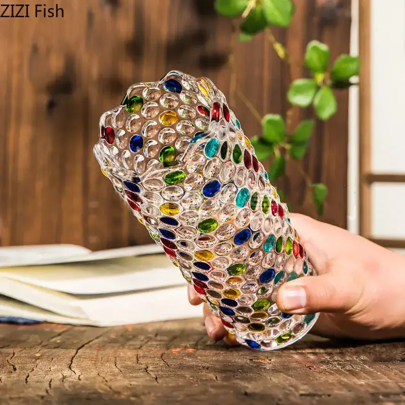 A clear decorbites glass vase with colorful faceted gemstones in a mosaic pattern for hydroponics flower pots