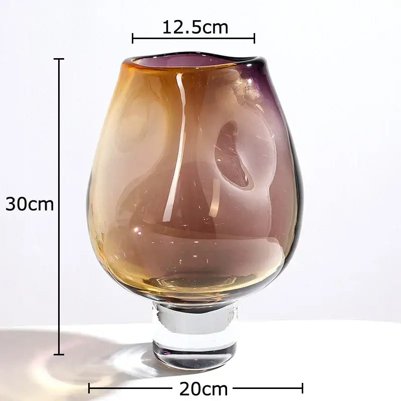 A tall slender decorbites glass vase with amber to deep purple gradient and clear crystal base for hydroponics plant use