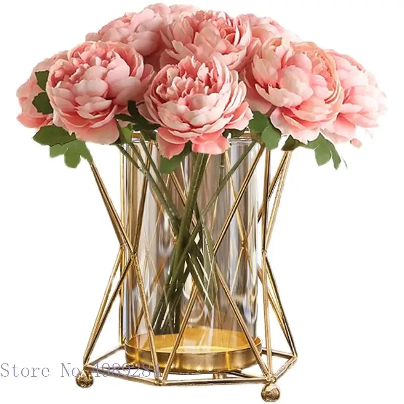 DecorBites™ glass vase metal frame geometric flower arrangement features a clear glass vase with pink peonies