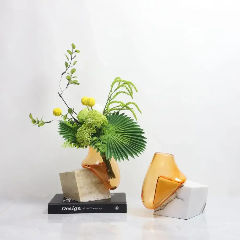 Modern amber decorbites glass vase with geometric design on marble base for elegant floral arrangements and home décor