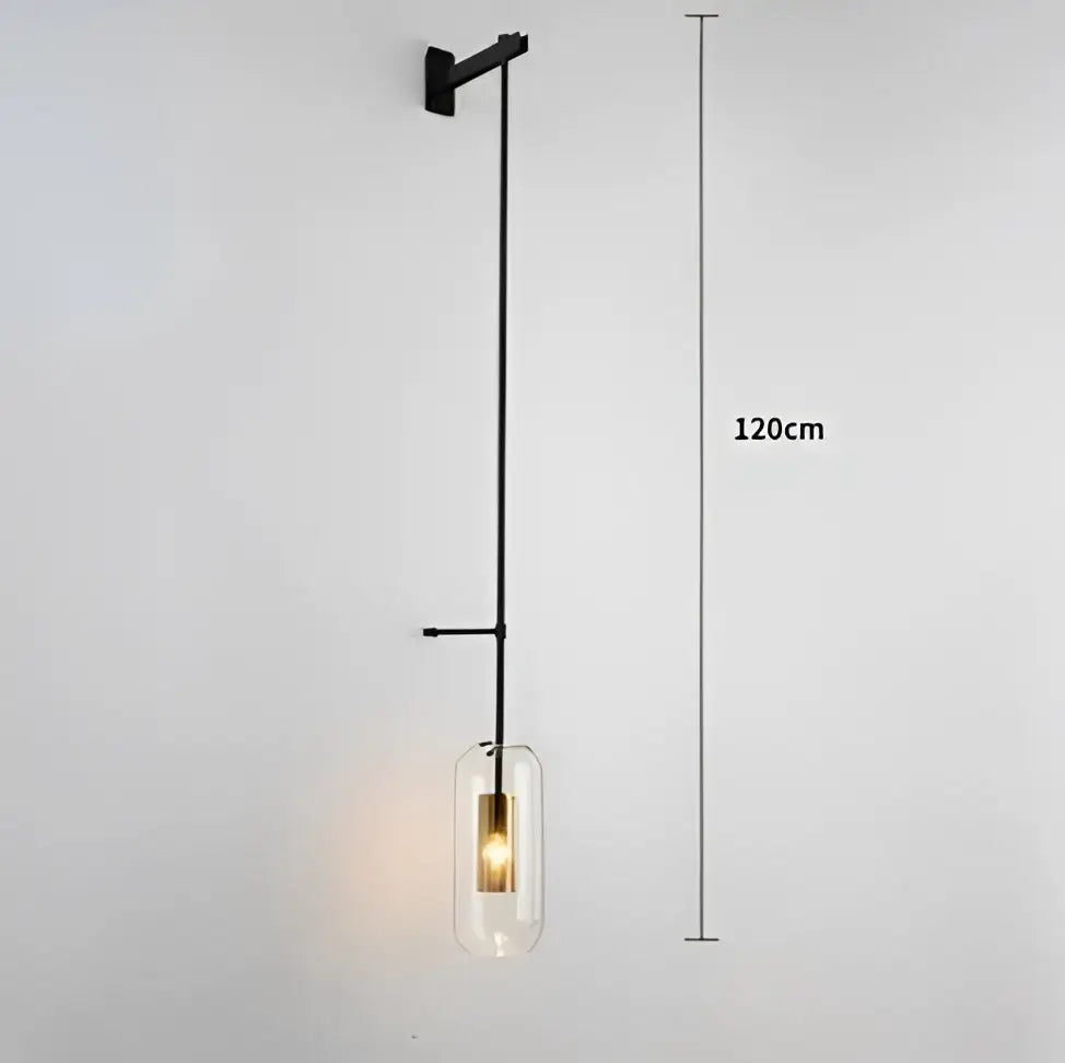 Black metal wall art light with clear glass pendant and exposed bulb for modern loft style living room decor