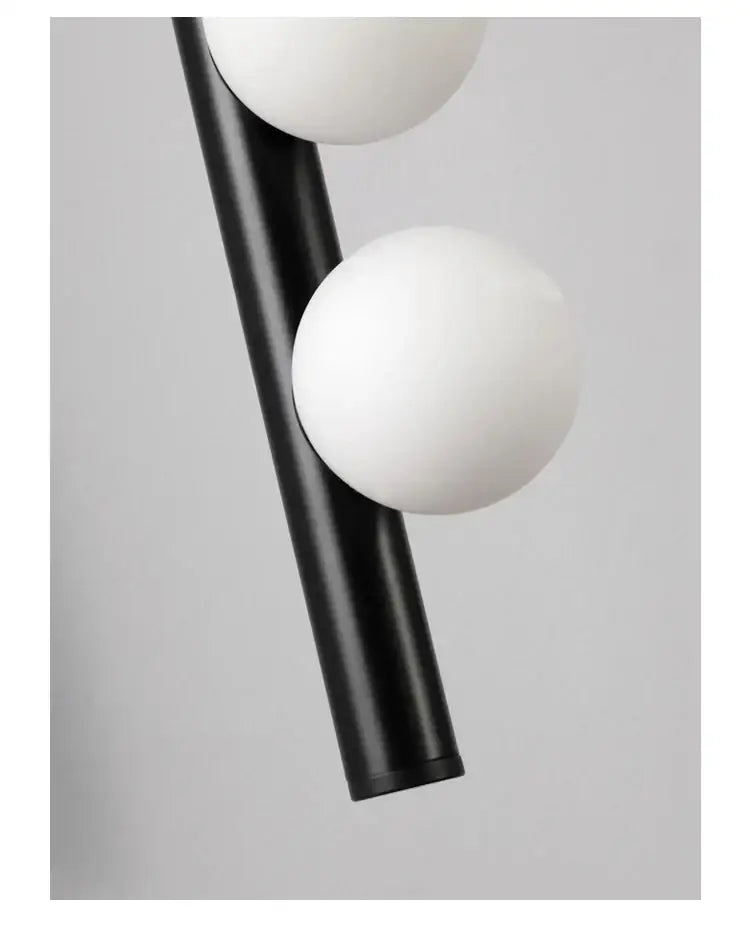 Black cylindrical decorbites glass wall lamp with two white spherical glass shades for living room or bedroom