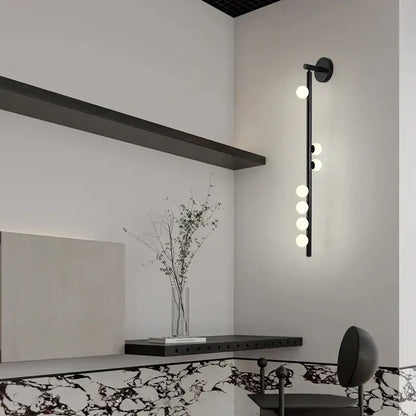 Black modern decorbites glass wall lamp with five spherical bulbs for clubhouse villa living room or bedroom bedside