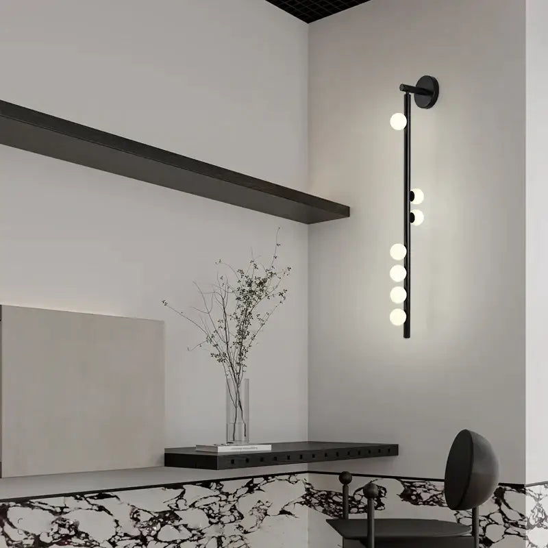 Black modern decorbites glass wall lamp with five spherical bulbs for clubhouse villa living room or bedroom bedside