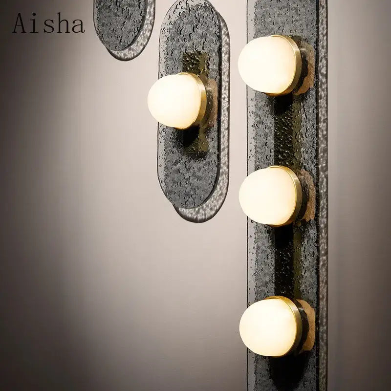 Industrial wall lamp decorbites glass wall lamp with three warm spherical bulbs in a dark textured metallic frame