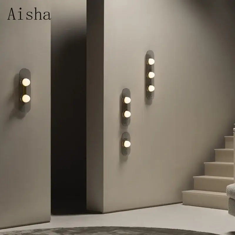DecorBites glass wall lamp with modern minimalist matte metal wall lamp and three warm-toned circular bulbs