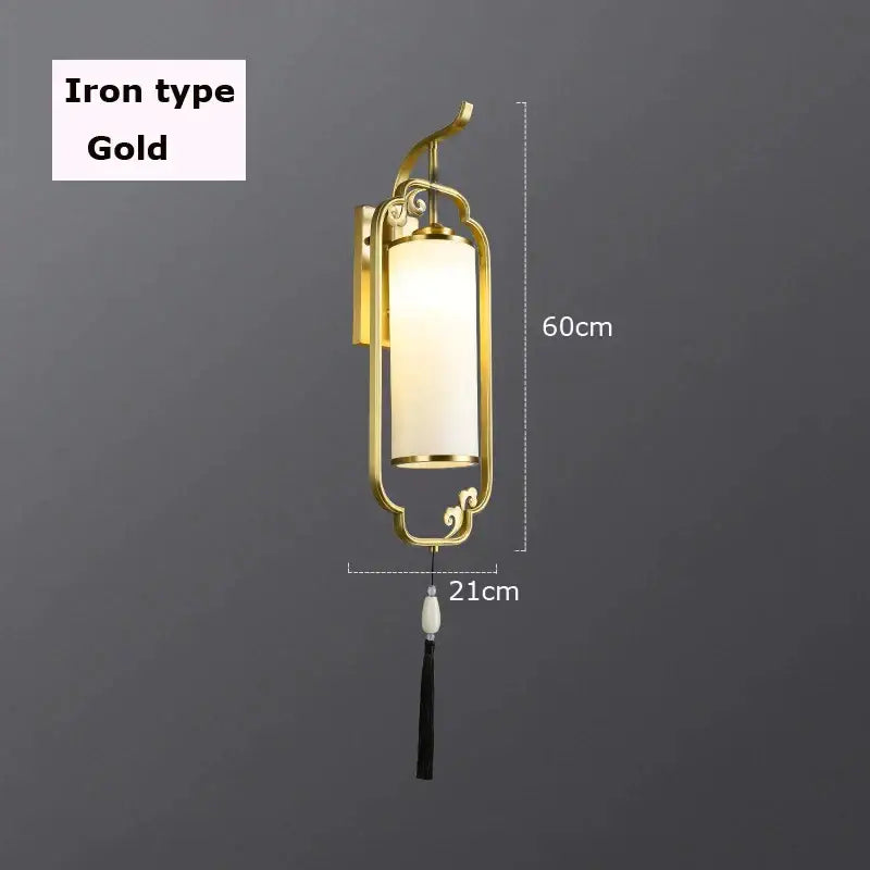 Gold iron DecorBites glass wall lamp with frosted glass cylinder and black tassel for living room and bedroom decor