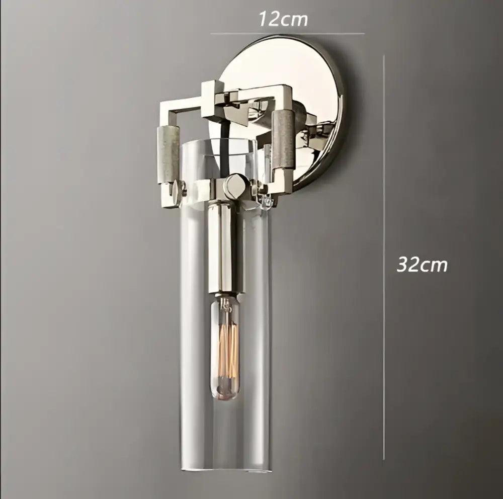 Modern chrome-finished decorbites glass wall lamp with clear glass cylinder and exposed filament bulb for industrial decor