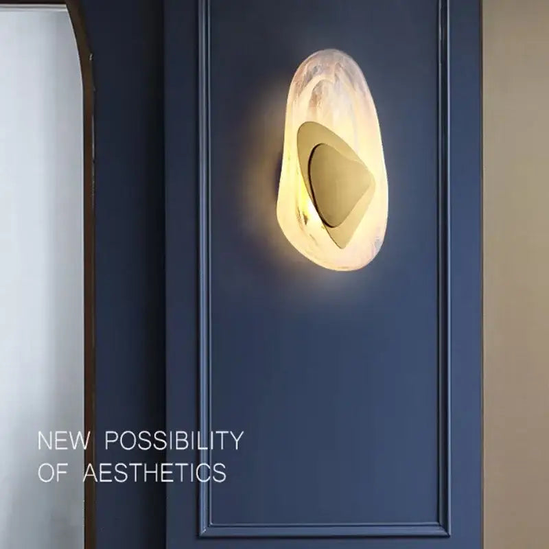 Decorbites glass wall lamp with iridescent translucent glass body and gold-toned frame for modern wall lamp use