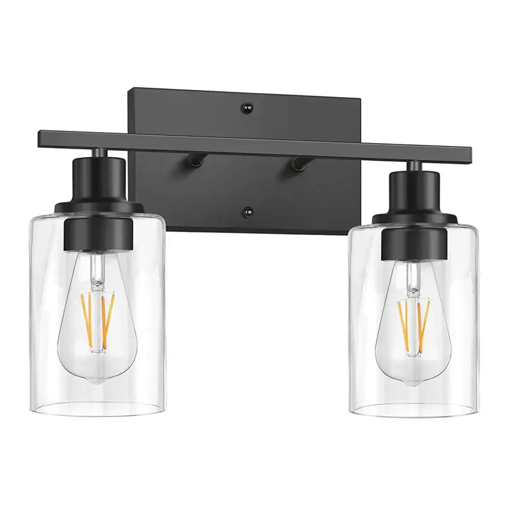 Black metal decorbites glass wall lamp with two clear glass cylinders and exposed filament bulbs for indoor lighting
