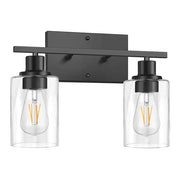Black metal decorbites glass wall lamp with two clear glass cylinders and exposed filament bulbs for indoor lighting