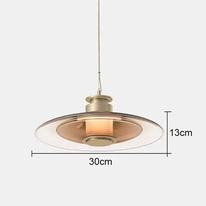 Modern decorbites glass wall lamp with warm amber glass shade and brushed brass frame for dining and living areas