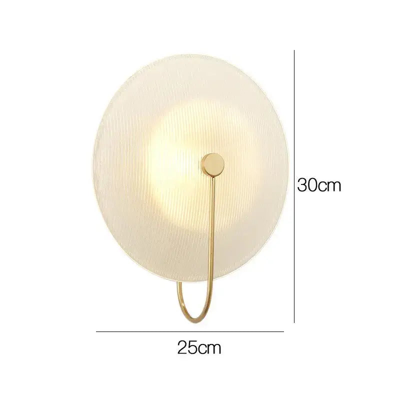 Modern decorbites glass wall lamp with circular frosted glass shade and gold-toned metal frame for home decor