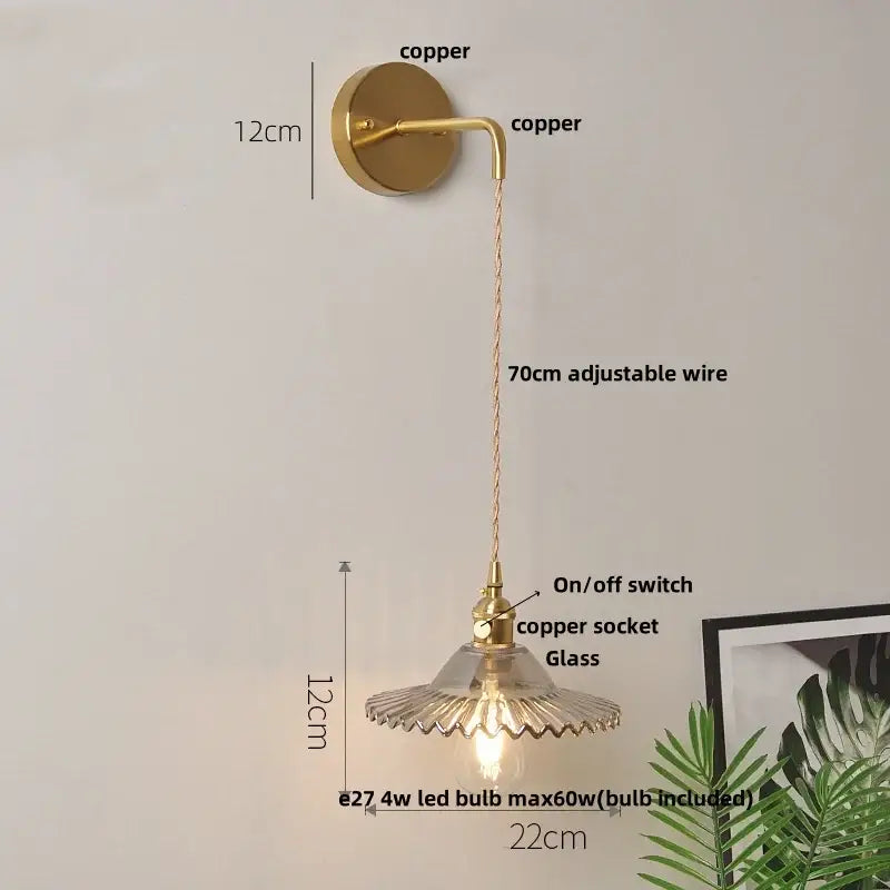 Gold-toned copper decorbites glass wall lamp with fluted glass shade and adjustable 70cm wire featuring pull chain switch
