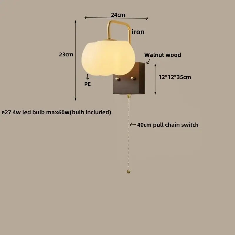Decorbites glass wall light fixture with warm-toned frosted pe lampshade brass frame and walnut wood mounting plate