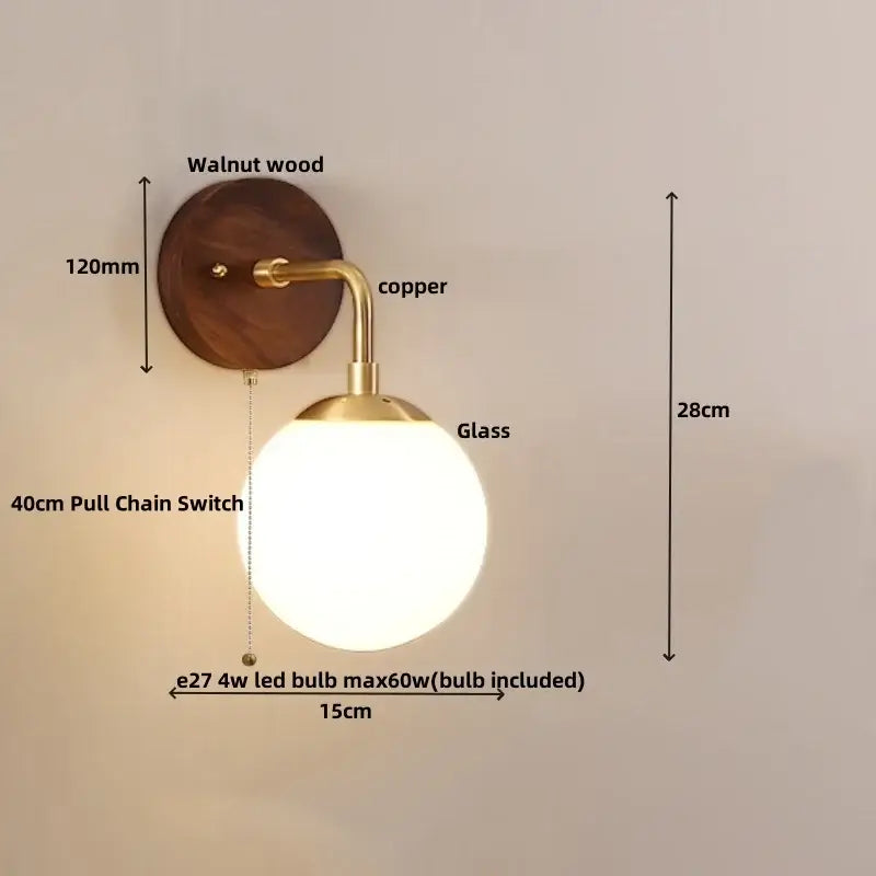 DecorBites glass wall light fixture with walnut wood backplate copper arm and frosted glass globe modern design