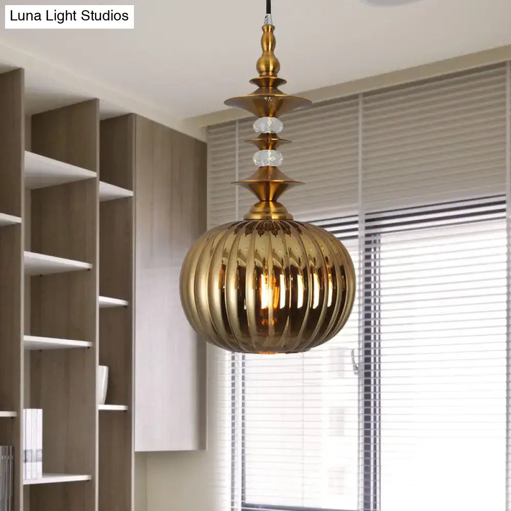 Golden ribbed glass pendant light with brass metal top and crystal accents for dining room in chrome copper gold finish