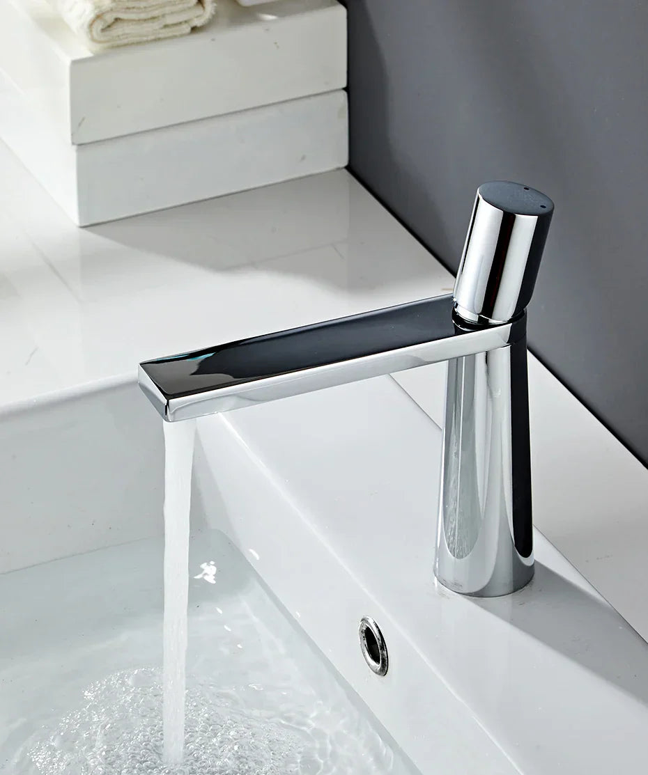 Modern decorbites gold brass basin faucet with sleek minimalist design and single cylindrical handle for bathroom sink