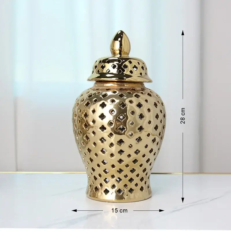DecorBites gold ceramic carved temple jar with intricate diamond cutouts and matching lid for home decor