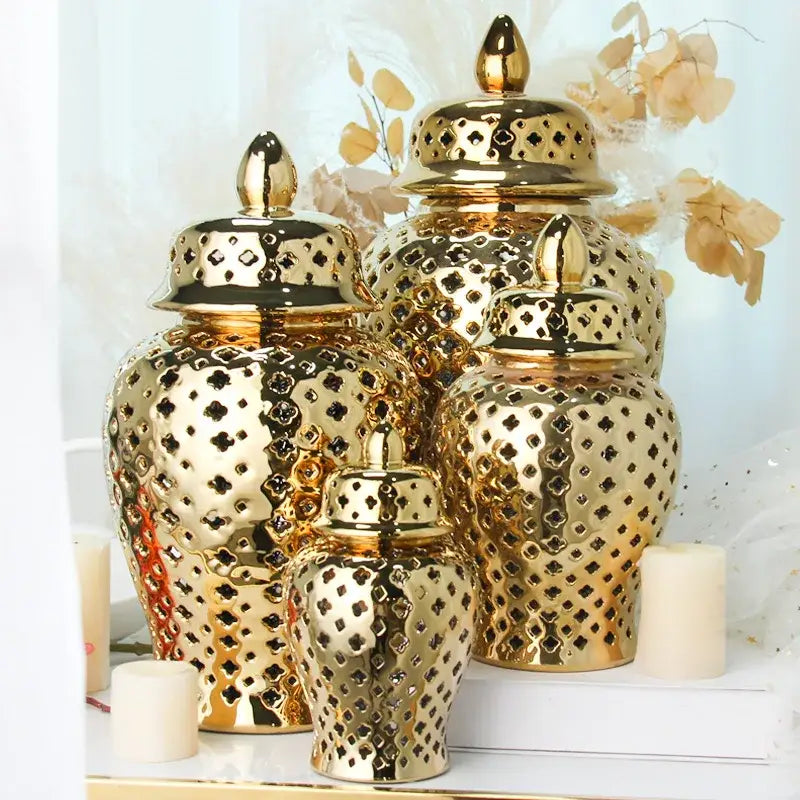 DecorBites gold ceramic carved temple jars with intricate diamond cutouts and lids in varying sizes for home decor