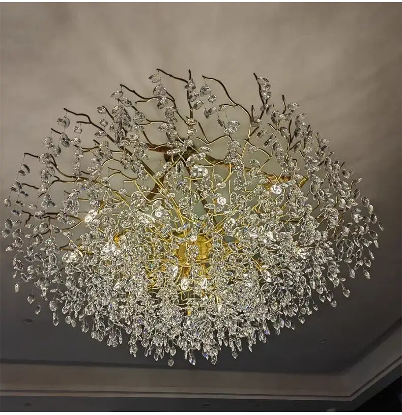 Golden branch-style DecorBites™ gold crystal led chandelier adorned with numerous clear crystal droplets for home lighting