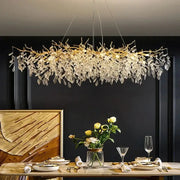 DecorBites gold crystal led chandelier featuring a gold branch design with cascading clear crystal leaves for home lighting