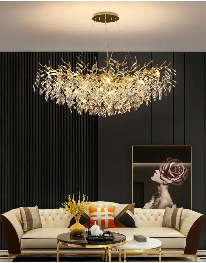 Decorbites gold crystal led chandelier shaped like a golden leaf with dangling crystal droplets for home lighting