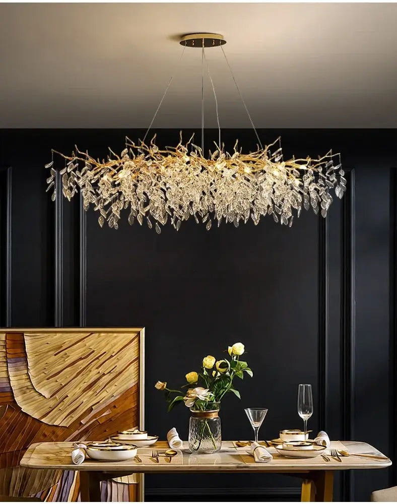 Decorbites gold crystal led chandelier with branch-like design and cascading crystal leaves for home lighting
