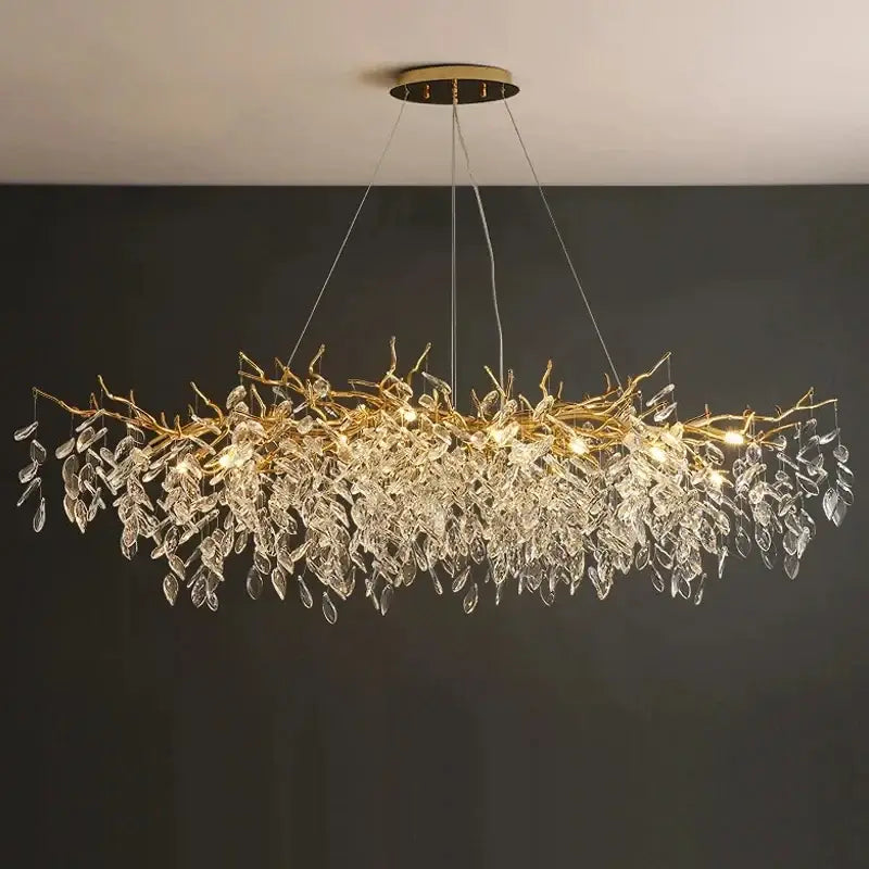 Decorbites gold crystal led chandelier with gold-toned branch metalwork and cascading clear crystal leaves for home lighting
