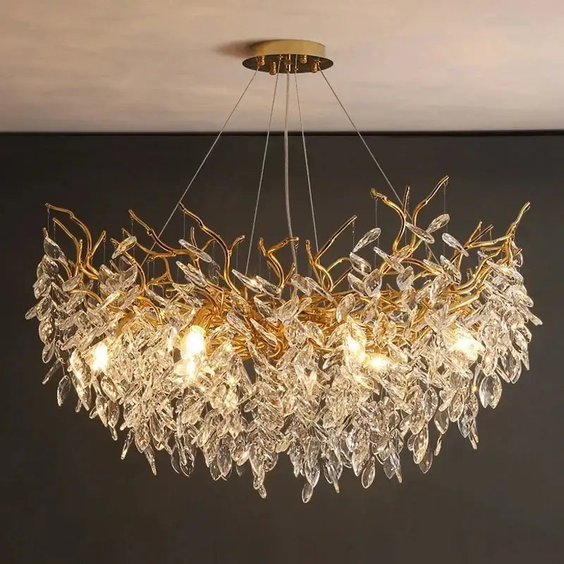 Decorbites gold crystal led chandelier with gold-toned leaf branches and cascading clear crystal leaves for home lighting