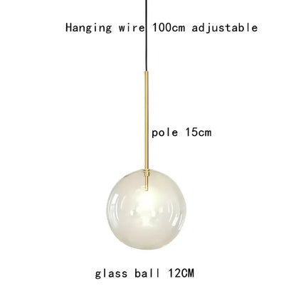 Decorbites gold glass bubble chandelier featuring a clear glass sphere with a brass pole and black adjustable wire