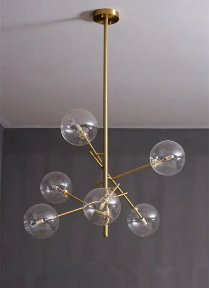 DecorBites gold glass bubble chandelier with gold-toned metal and clear spheres for modern dining room lighting