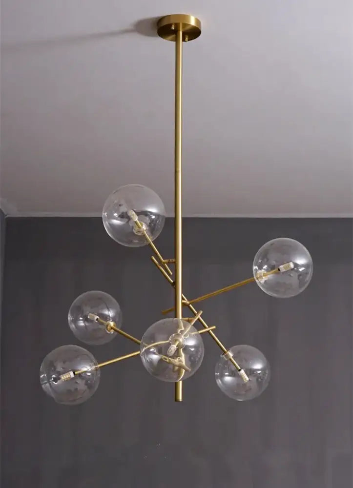 DecorBites gold glass bubble chandelier with gold-toned metal and clear spheres for modern dining room lighting