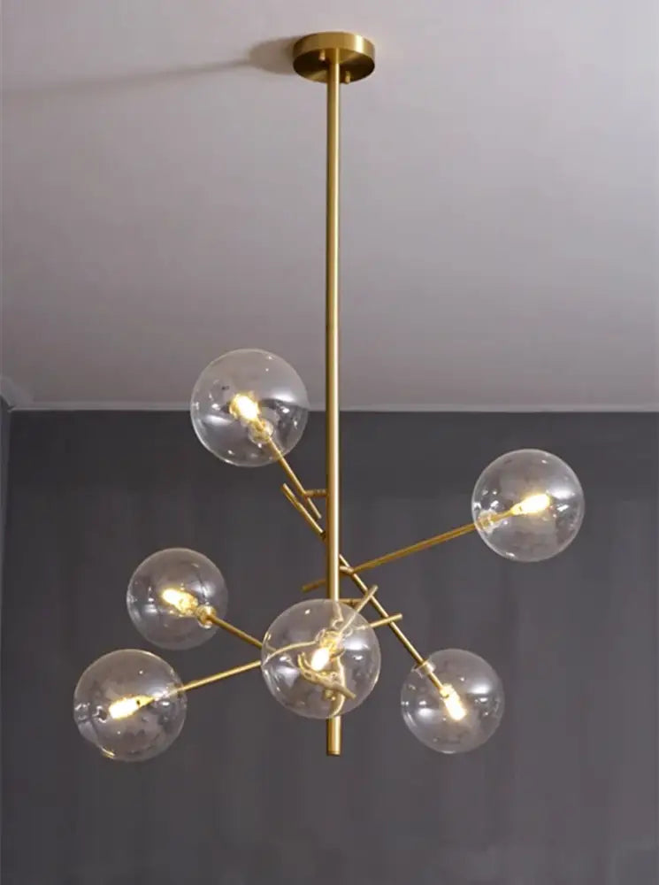DecorBites™ gold glass bubble chandelier with clear glass spheres and slender gold-toned arms for dining room
